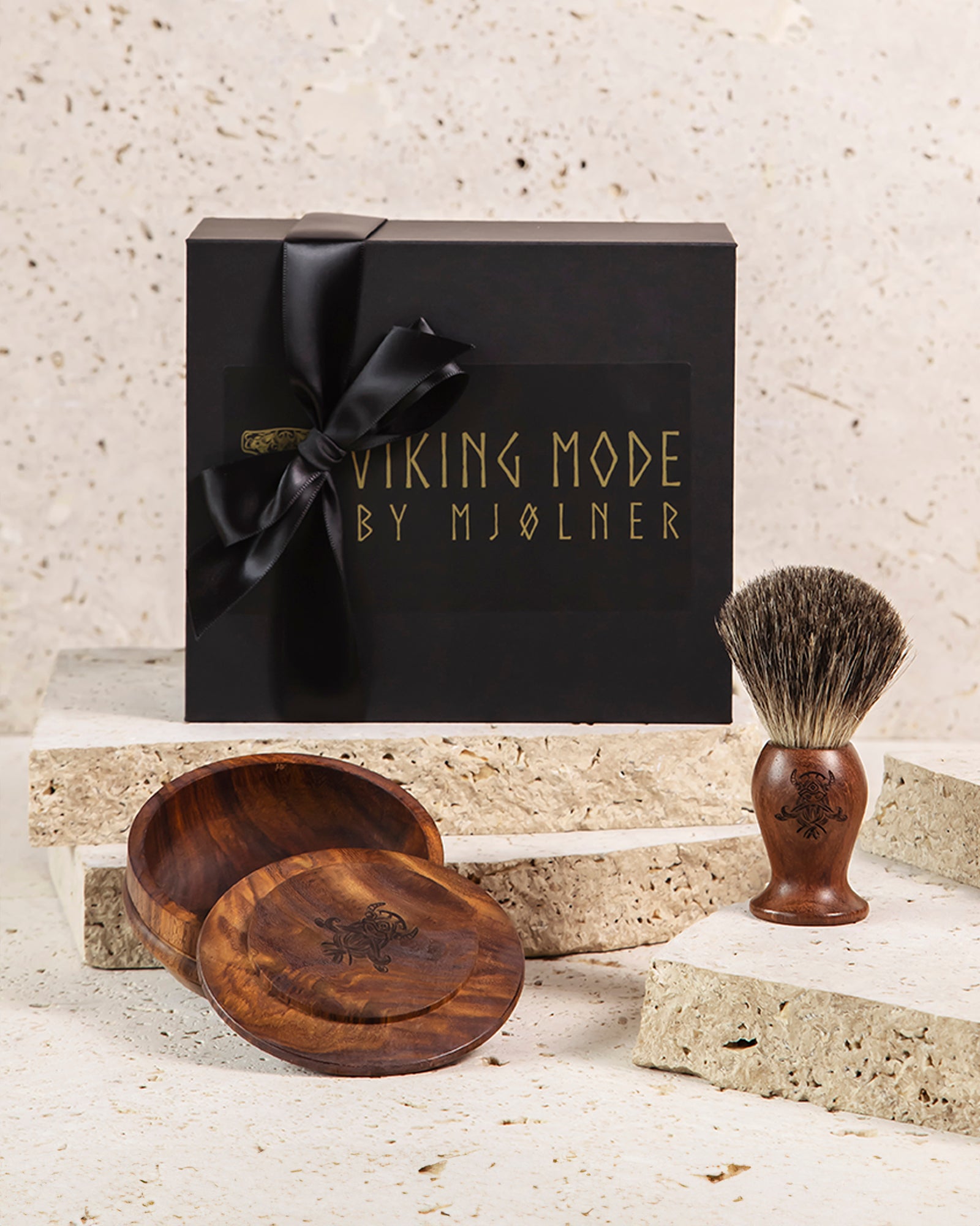 A shaving gift set featuring a rosewood shaving bowl, a rosewood badger hair brush, and a double gift box with 'VIKING MODE by MJØLNER' printed on it.